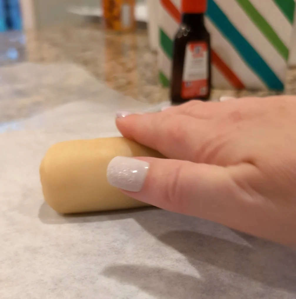 rolling dough for almond cookies