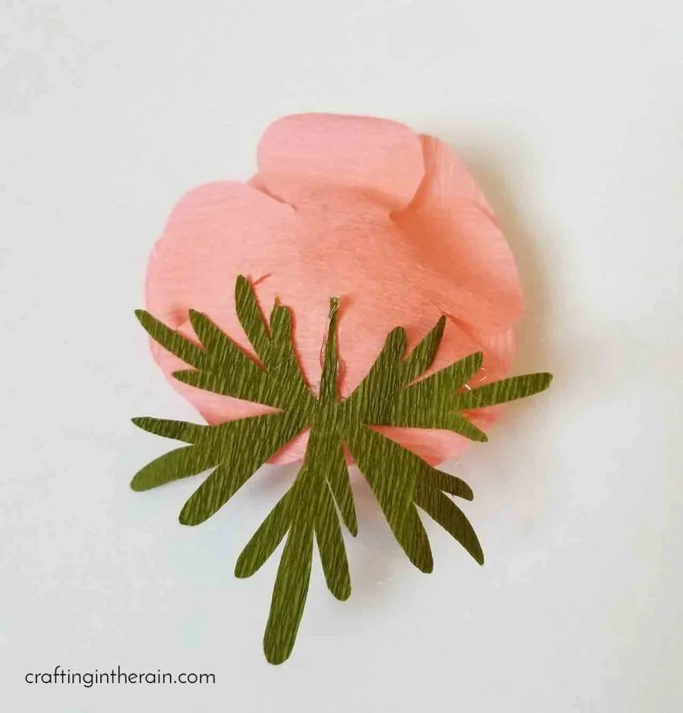 Crepe paper flower assembly