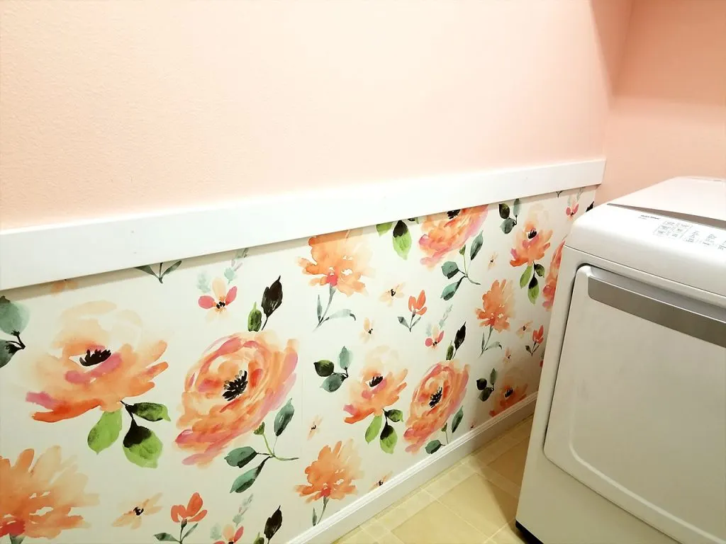 Pink flower wallpaper in laundry room