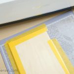 tape basswood to Cricut mat