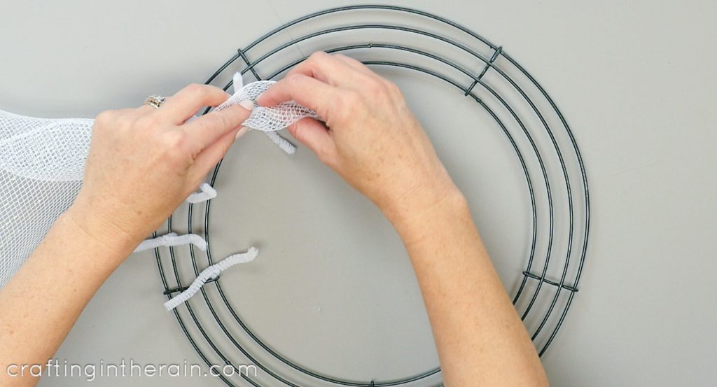 Attach mesh to wire wreath