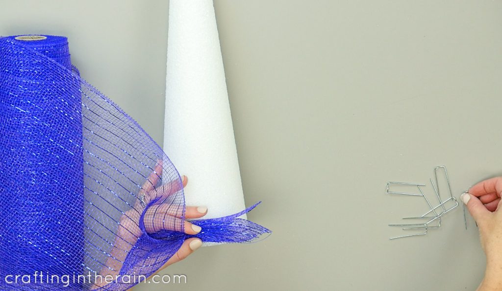 Decorate a foam cone with deco mesh