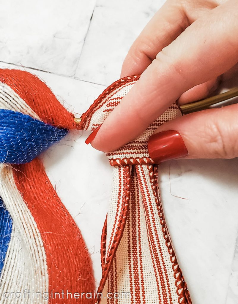 Tie ribbon on hoop wreath