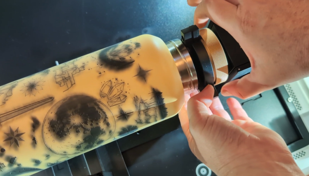 remove tumbler from engraving clamp